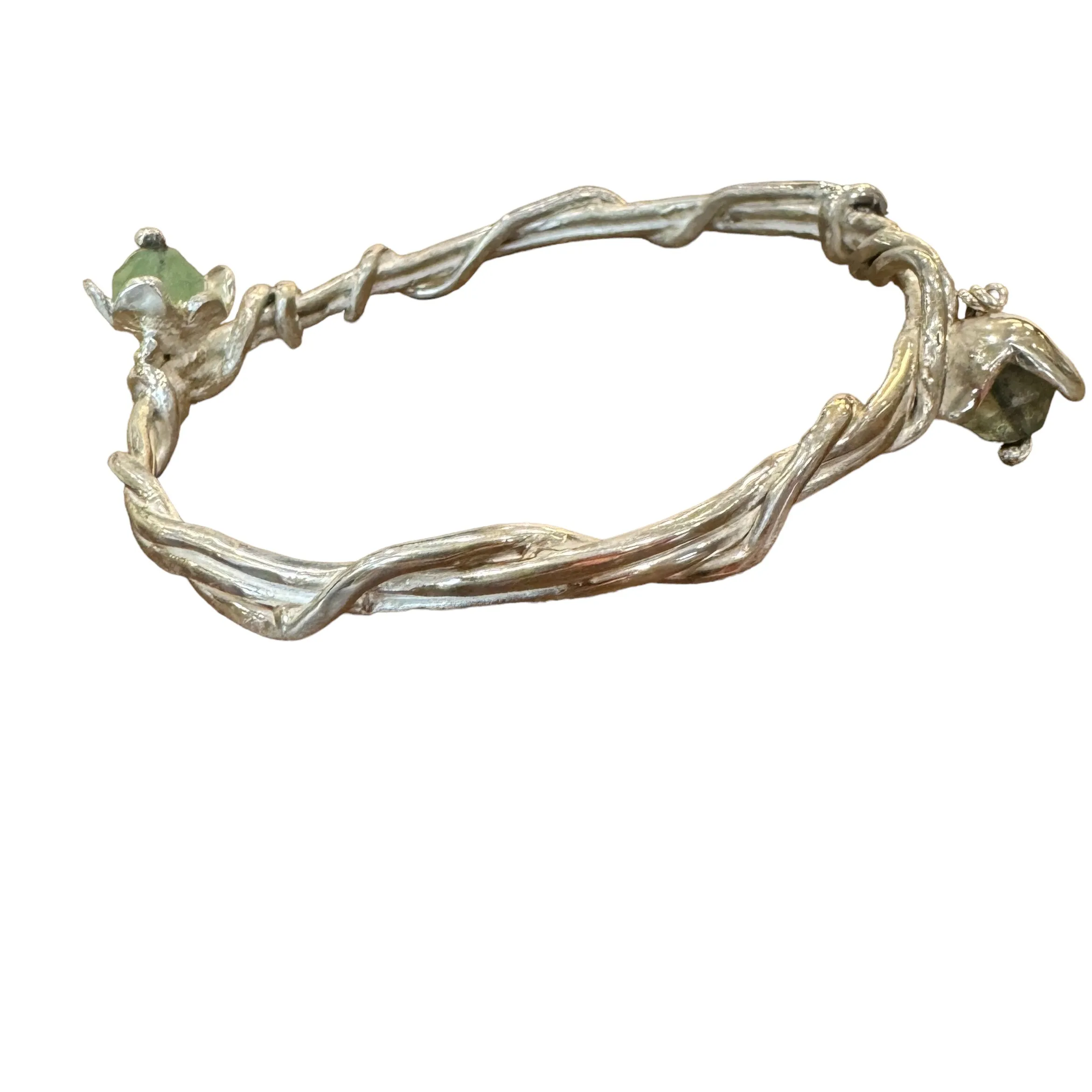 Twisted silver bangle with flower charms